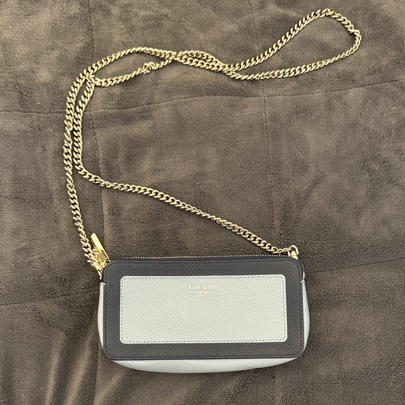 kate spade Handbags - NWOT Kate spade mini purse navy baby blue detail leather